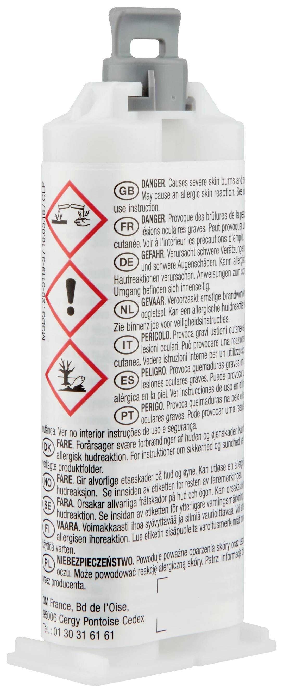 Eine Tube mit Warnsymbolen für gesundheitsschädliche Substanz, mit Hinweisen auf möglichen Hautkontakt. In mehreren Sprachen beschriftet.