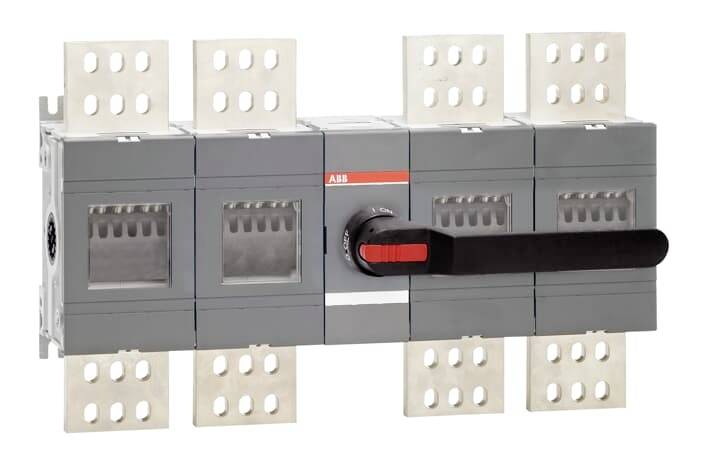 Ein großer, grauer elektrischer Schalter mit einem roten Hebel in der Mitte, umgeben von mehreren Anschlusskontakten.