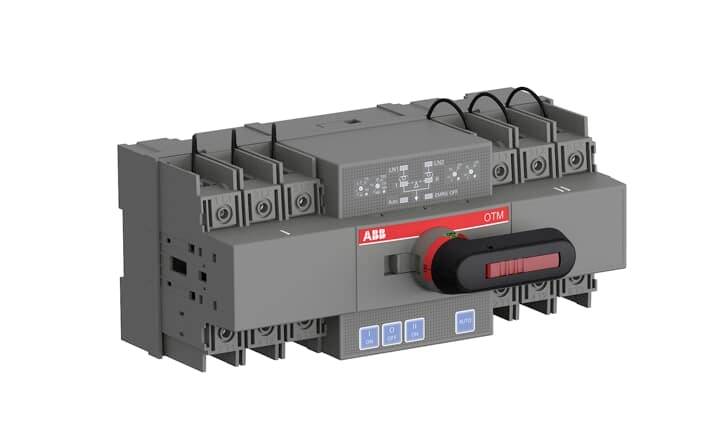 Ein elektrischer Schalter mit mehreren Anschlüssen, LED-Anzeigen und einem großen Drehgriff, markiert mit einem roten Etikett 'OTM'.