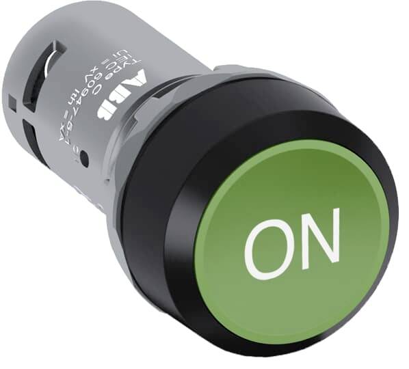 Ein grüner Knopf mit der Aufschrift 'ON' auf einem zylindrischen Gehäuse.