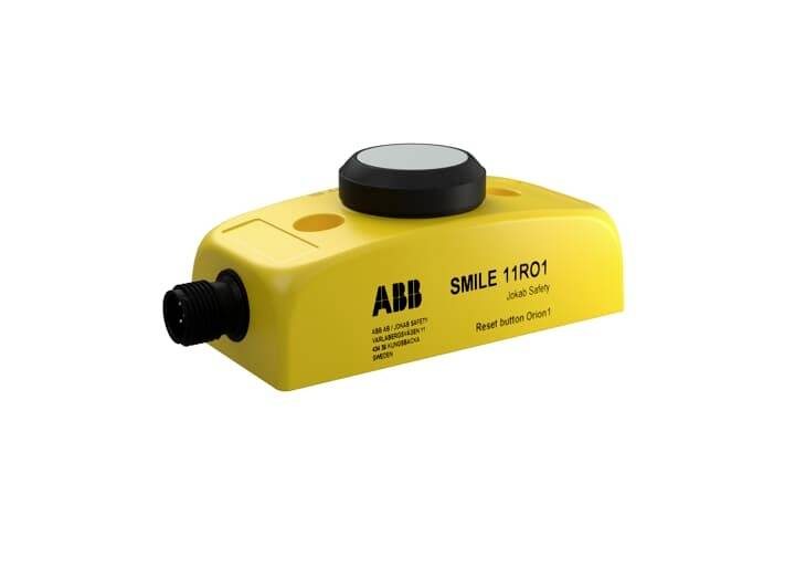 Ein gelbes Industrie-Sicherheitsschaltergehäuse von 'ABB' mit rundem Druckknopf, Modellnummer 'SMILE 11R01'.