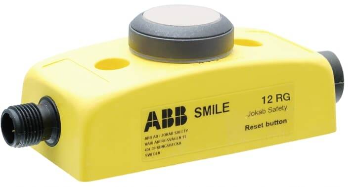 Gelbes Sicherheitsmodul 'ABB SMILE 12 RG' mit Reset-Taste und schwarzem Anschlussstecker.
