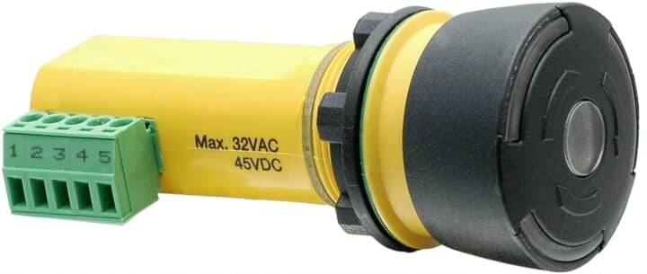 Ein gelber, zylindrischer Schalter mit grünem Anschlussblock. Darauf steht 'Max. 32VAC, 45VDC'.