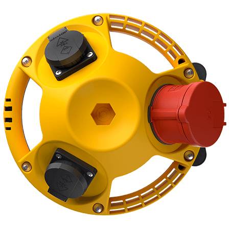 Gelbes, rundes Gerät mit rotem Anschluss und zwei schwarzen Buchsen. Verwendet für Stromverbindungen.