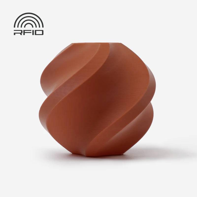 Eine spiralförmige, rotbraune Vase auf einem weißen Hintergrund. Oben links ist ein 'RFID'-Symbol abgebildet.