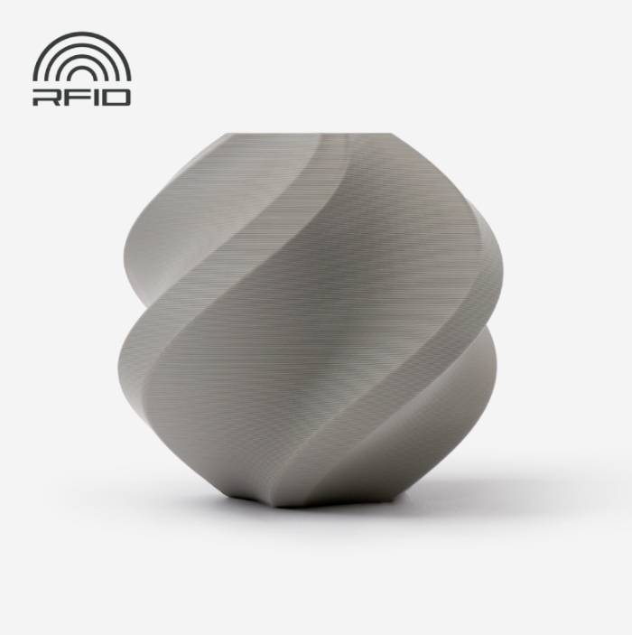 Graues, spiralförmiges Objekt mit RFID-Logo in der oberen Ecke; futuristisches Design und glatte Oberfläche, auf weißem Hintergrund.