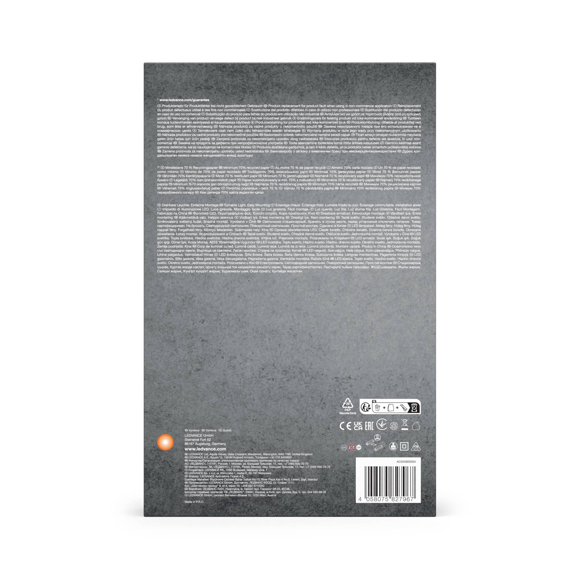 Eine graue Verpackung mit weißem Textblock oben, darunter kleinere weiße Texte. Unten rechts Symbole und ein Barcode.