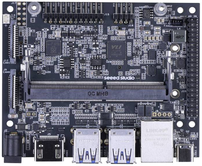 Ein Mikrocontroller-Board mit zahlreichen Anschlüssen und Schaltkreisen, von 'Seeed Studio' auf der Platine beschriftet, in Draufsicht.