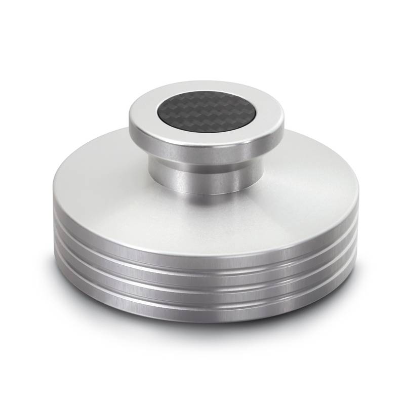 Ein runder, silberner Plattenbeschwerer aus Metall mit einem gemusterten, schwarzen Einsatz oben. Verwendet zur Stabilisierung von Schallplatten.