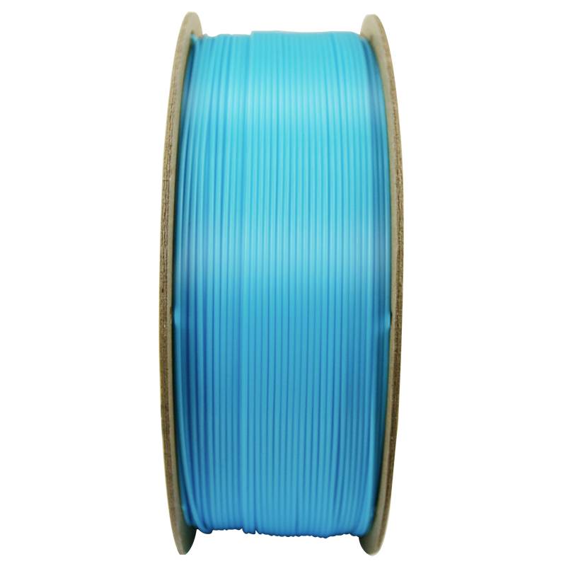 Spule mit türkisfarbenem Filament, das in 3D-Druckern verwendet wird.