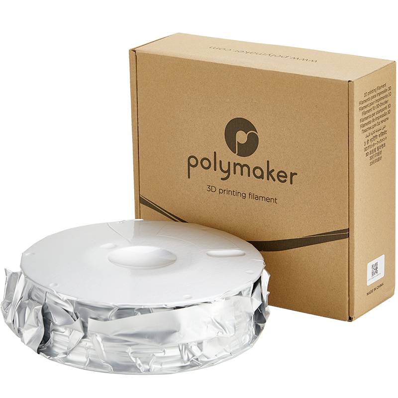 Eine Rolle Polymaker 3D-Druckfilament, teilweise noch in der Verpackung, neben einer braunen Kartonschachtel mit Polymaker-Logo.