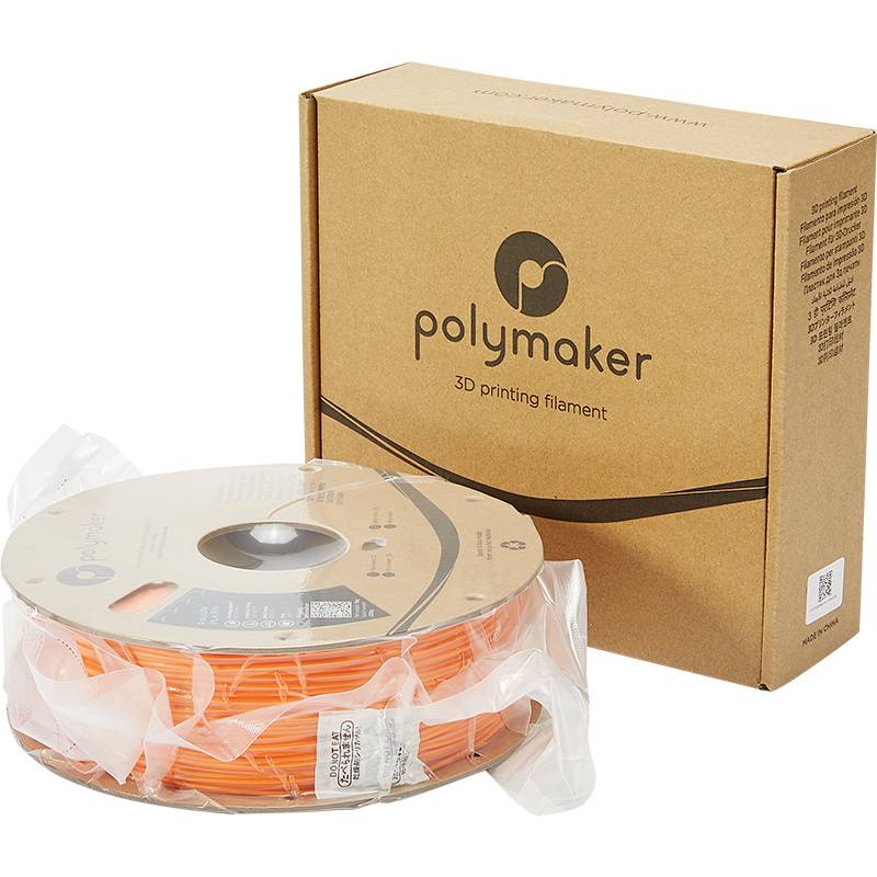 Eine Rolle orangefarbenes 3D-Drucker-Filament von Polymaker neben einer braunen Verpackungsbox.