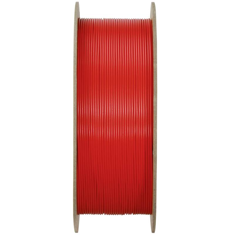 Eine Spule mit leuchtend rotem Kabel.