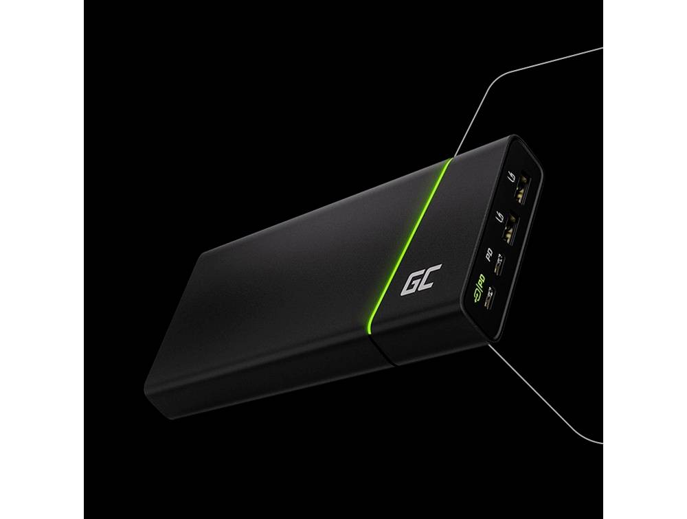 Externe schwarze Powerbank mit leuchtendem grünen Streifen, zeigt Anschlüsse und Kapazität. Entworfen für mobiles Laden unterwegs.