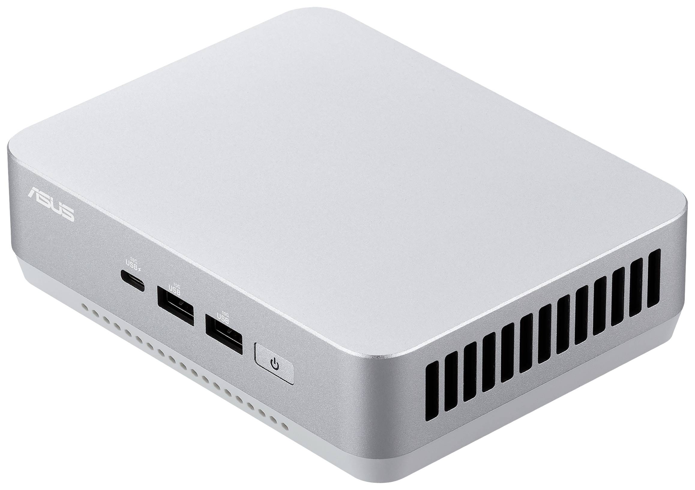 Ein silberner Mini-PC mit mehreren Anschlüssen an der Vorderseite, darunter USB-Ports und ein Netzschalter.