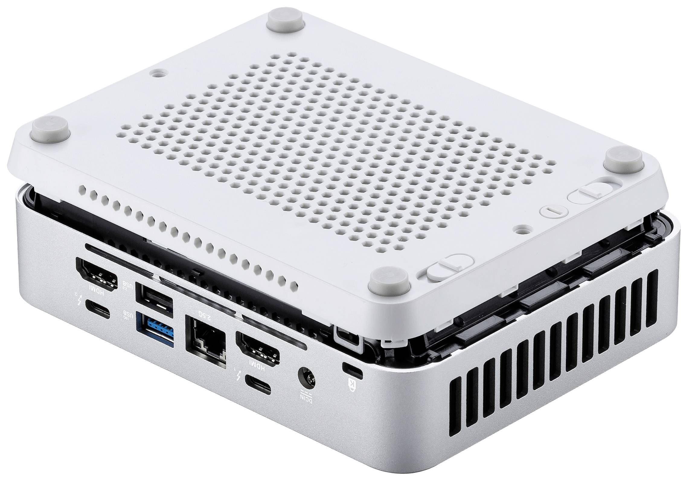 Ein kompakter Mini-PC in Silber mit mehreren Anschlüssen auf der Rückseite. Das Gehäuse ist geöffnet, um die Oberseite anzuzeigen.