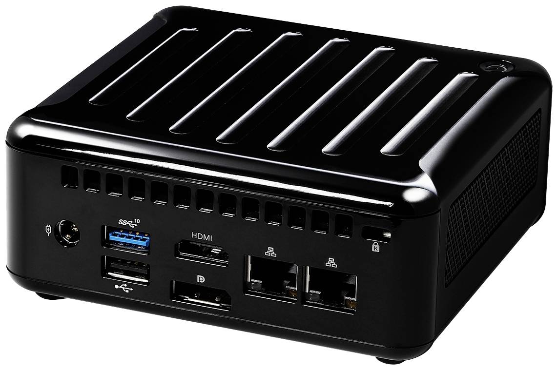 Ein kompakter, schwarzer Mini-PC mit Lüftungsschlitzen und mehreren Anschlüssen, darunter USB, HDMI und Ethernet, an der Vorderseite.