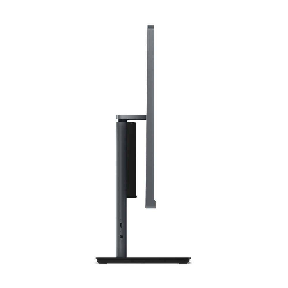 Seitenansicht eines schwarzen Computerbildschirms auf einem Standfuß, zeigt das schlanke Design und die geringe Tiefe.