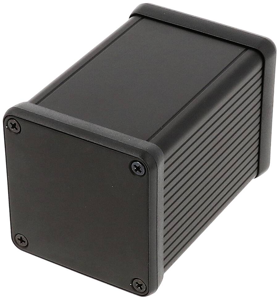 Ein rechteckiges, schwarzes Gehäuse mit gerippten Seiten und Schrauben an den Ecken des Deckels.