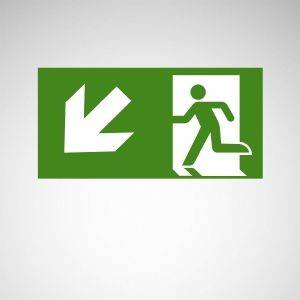 'Notausgang' Schild mit grünem Hintergrund zeigt eine Figur, die nach links unten läuft, um einen Ausgang zu erreichen.