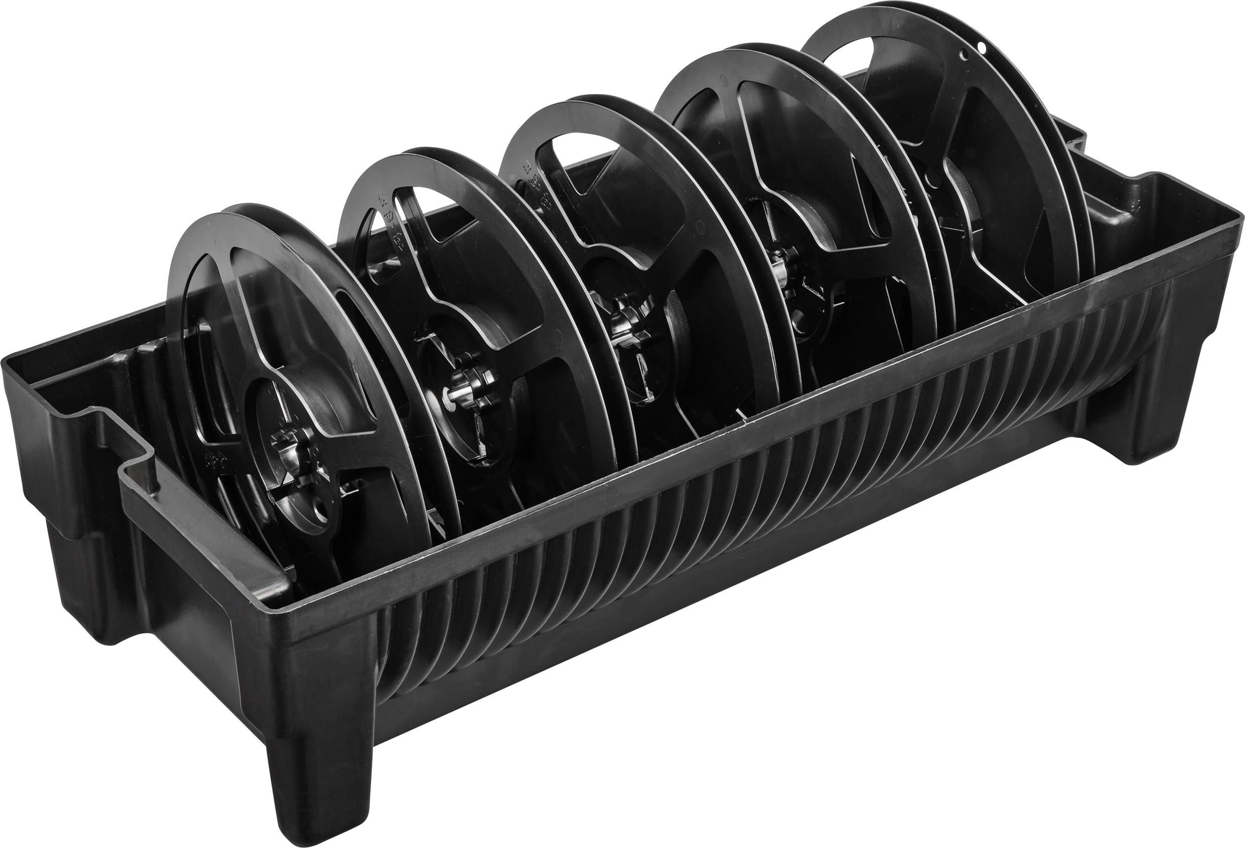 Eine schwarze Kunststoffbox enthält mehrere schwarze Spulen, die horizontal nebeneinander angeordnet sind.