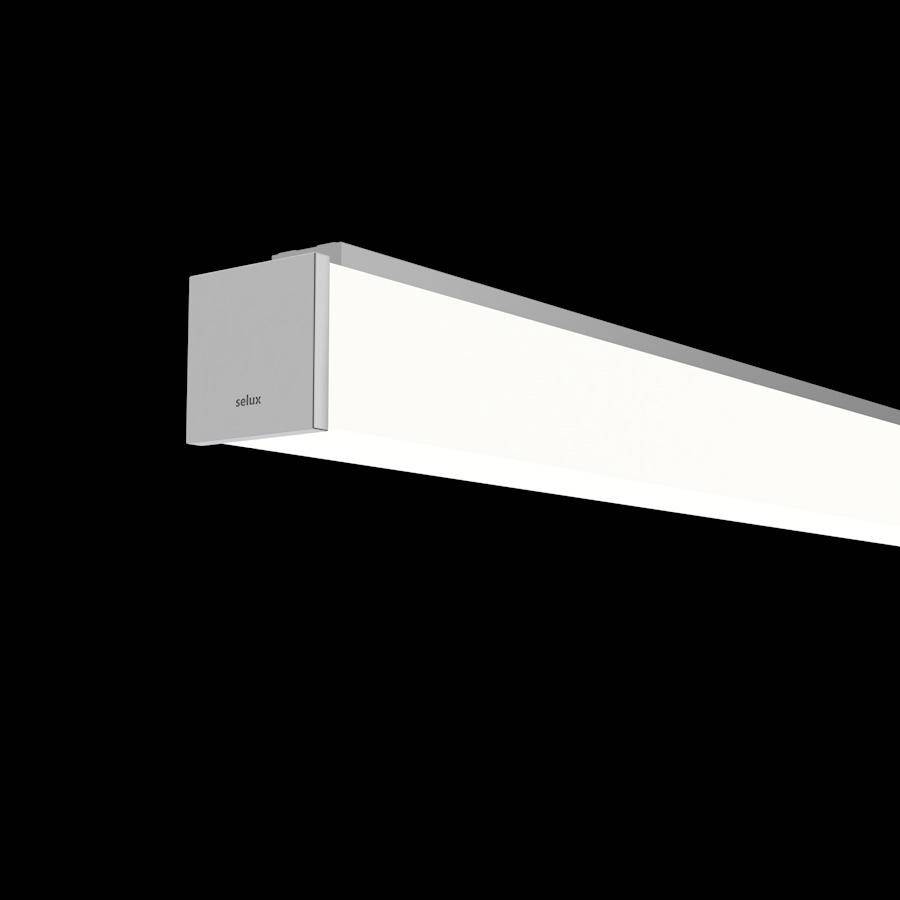 Eine rechteckige LED-Leuchte mit silberner Umrandung strahlt weißes Licht aus.