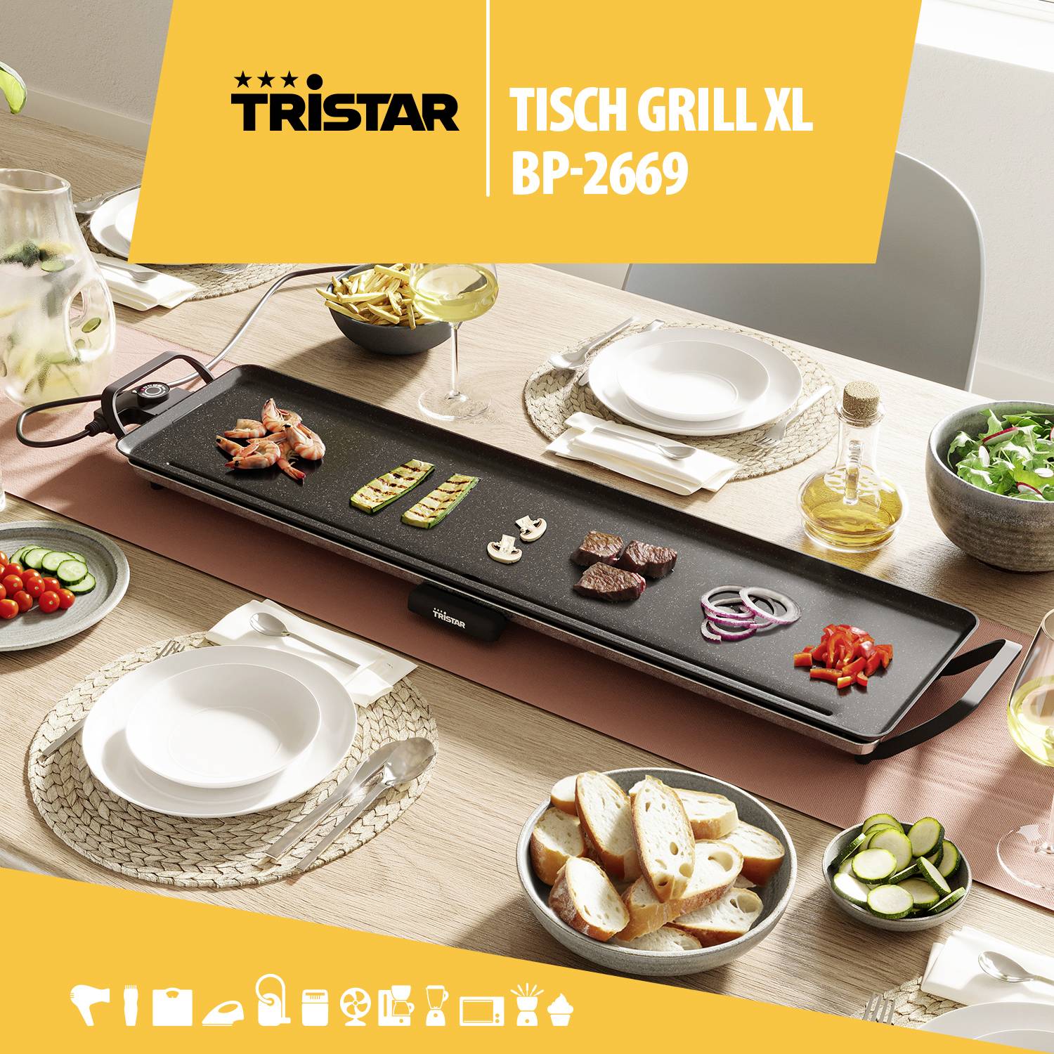 Ein Tischgrill von Tristar auf einem gedeckten Tisch, umgeben von Gemüse und Brot. Produktname 'Tisch Grill XL BP-2669' oben zu sehen.