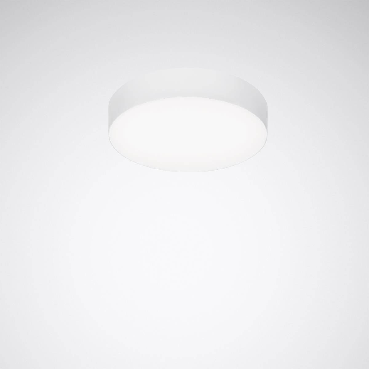 Runder, weißer Deckenstrahler mit diffusem Licht auf grauem Hintergrund.