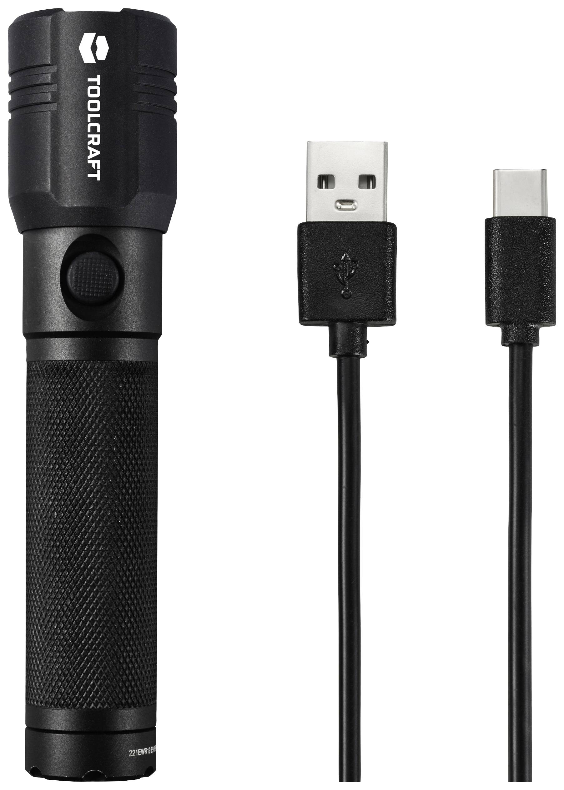 Eine schwarze Taschenlampe neben einem USB-C-Ladekabel.