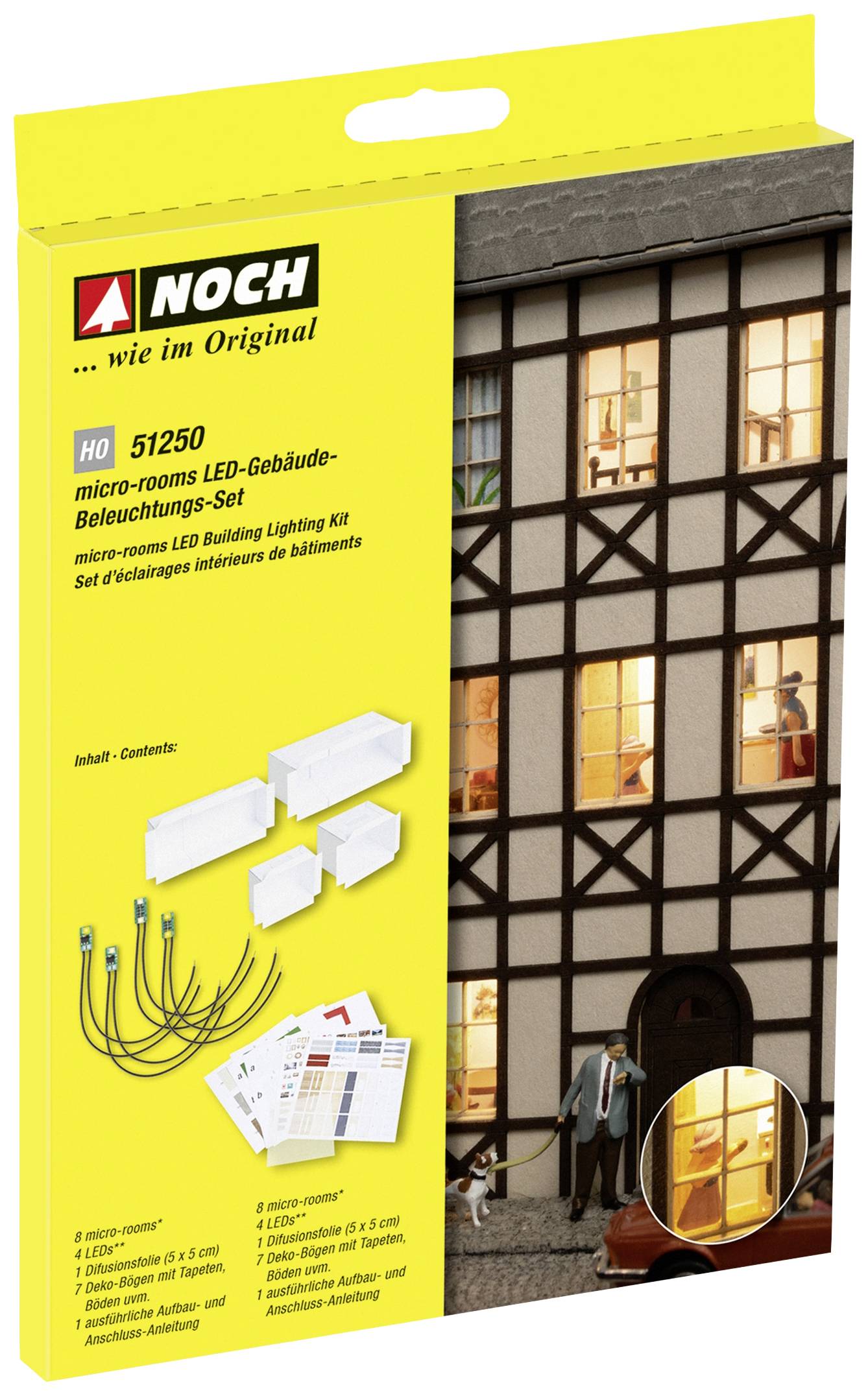 Bausatzverpackung für ein LED-Gebäude-Beleuchtungs-Set. Enthält LEDs, Kabel und Anleitungen. Zeigt ein beleuchtetes Modellhaus.