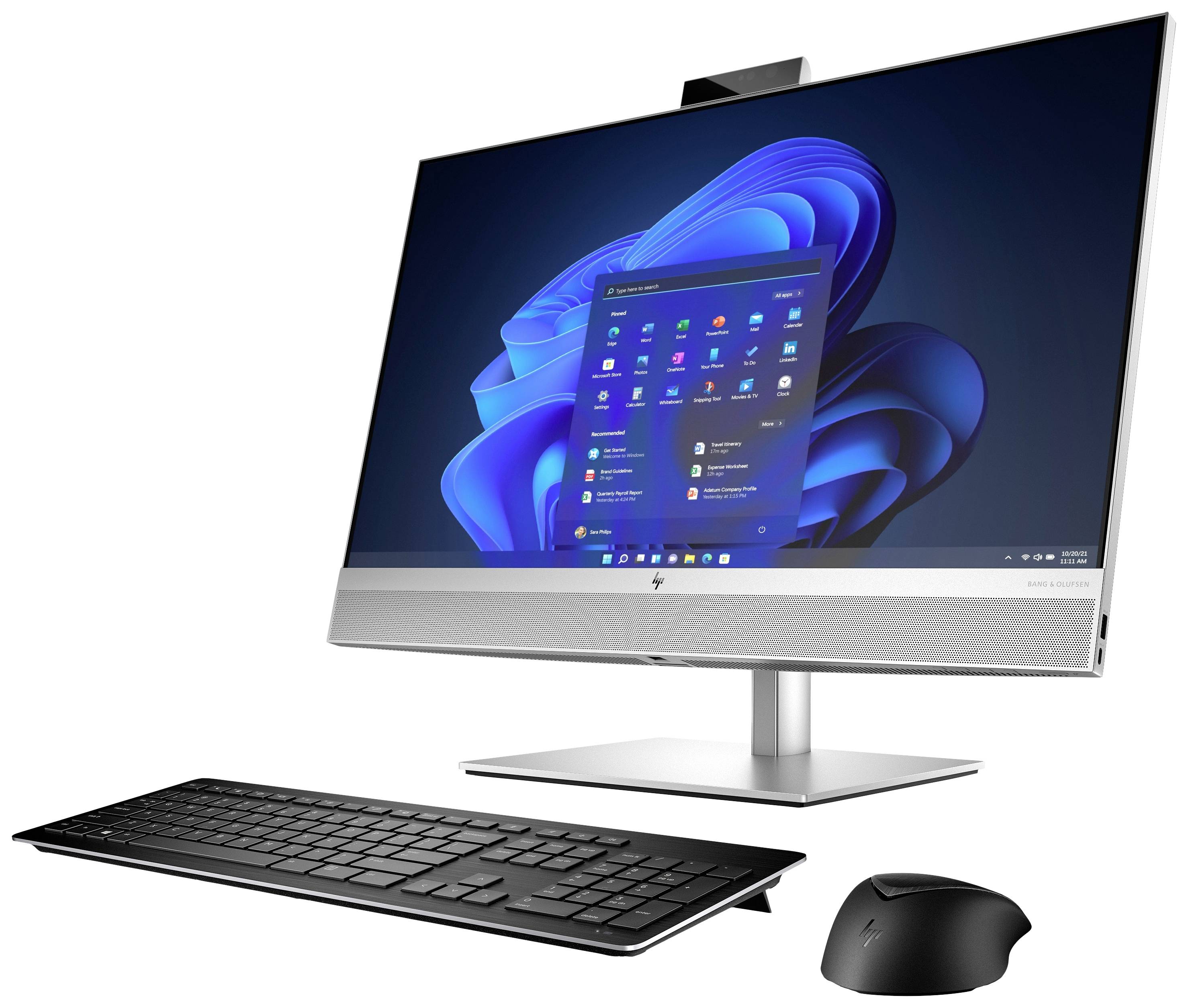 All-in-One-Computer mit Tastatur und Maus, zeigt Windows-Desktop mit blauer Spirale und geöffneter Startmenü-Anzeige.