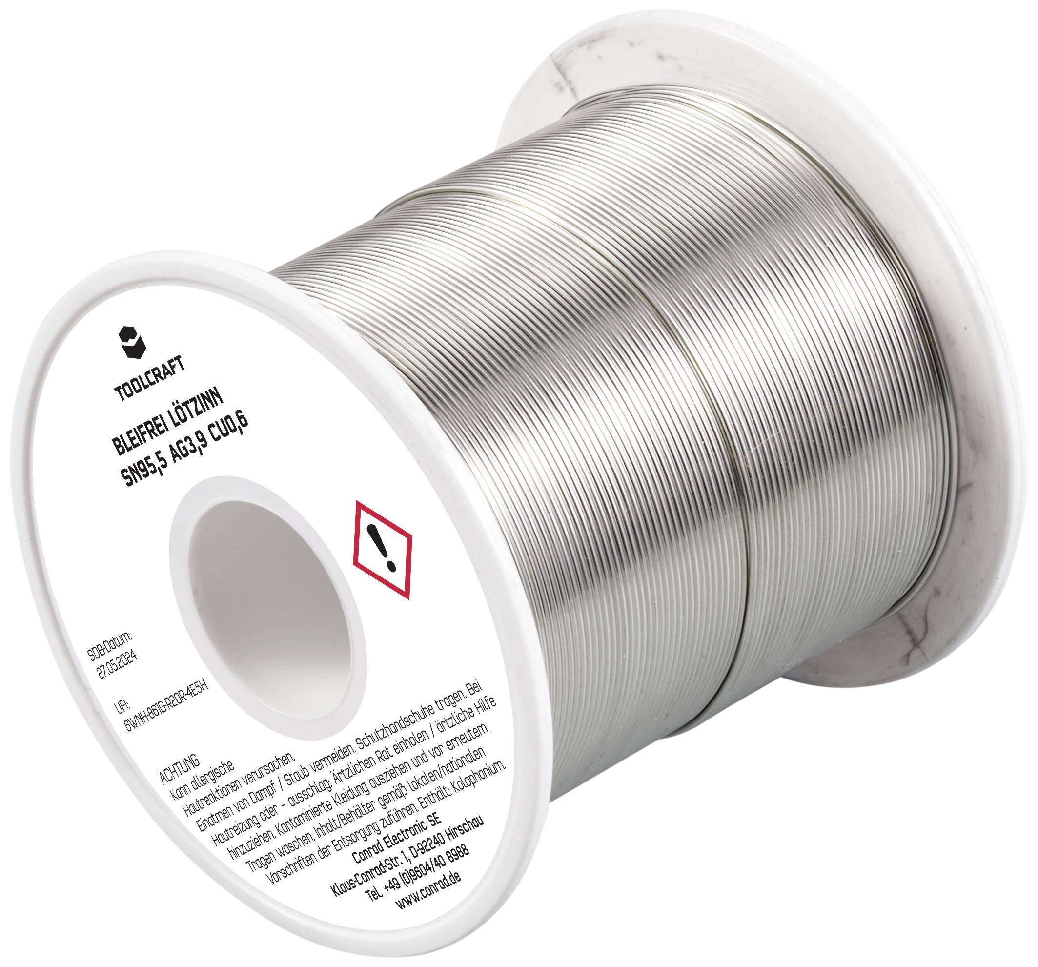 Spule mit silbernem Lötzinn, Markenname 'Toolcraft'. Etikett enthält Warnsymbole. Hauptsächlich für elektronische Lötarbeiten verwendet.