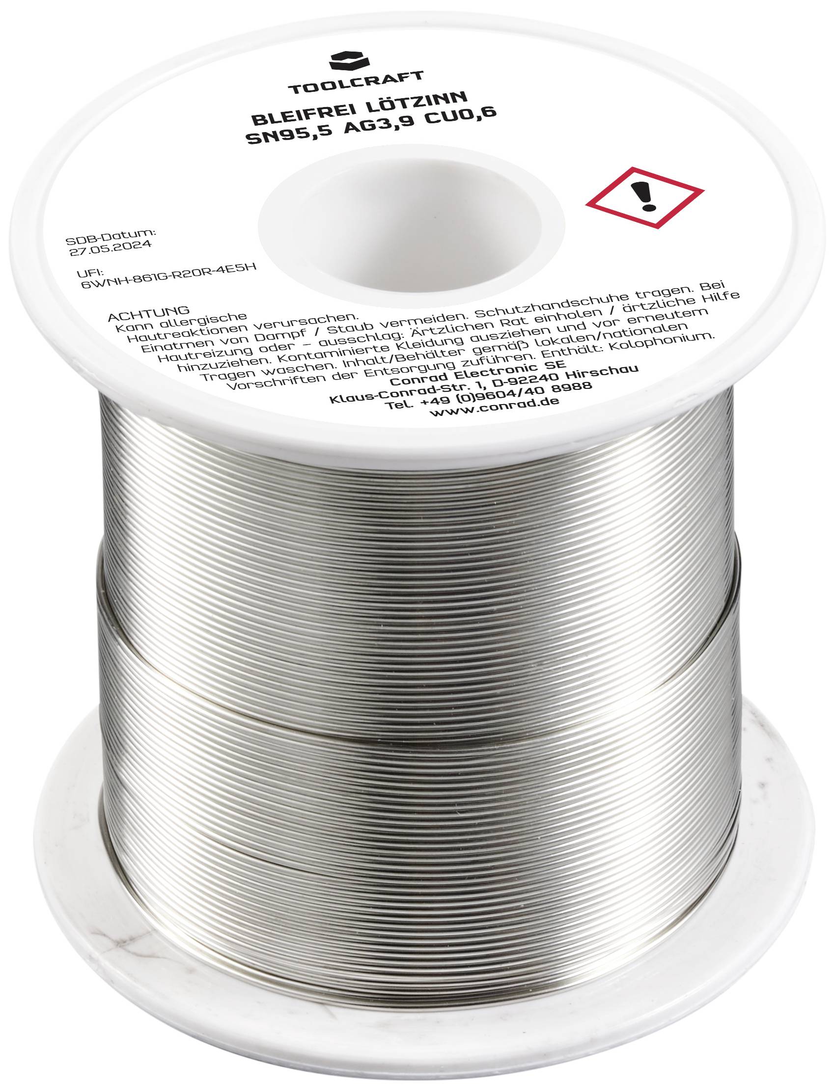 Spule mit bleifreiem Lötzinn, Typ Sn95,5 Ag3,8 Cu0,6. Warnsymbol für Gefahrenhinweise sichtbar. Marke TOOLCRAFT.