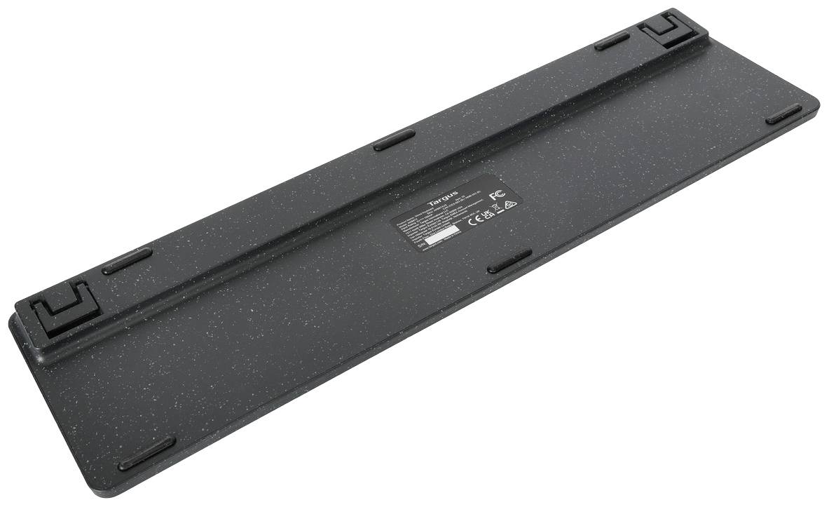 Eine schwarze Tastaturablage mit rutschfesten Pads an den Ecken. Die Oberfläche ist glatt und gleichmäßig.