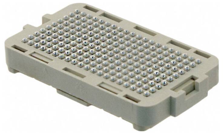 Ein rechteckiger Stecker mit mehreren kleinen metallischen Stiften, der für elektronische Verbindungen oder Schnittstellen verwendet wird.
