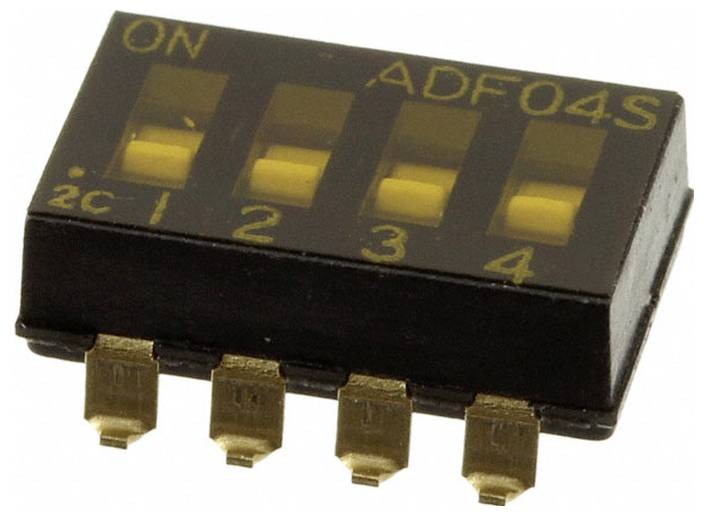 Ein kleiner schwarzer DIP-Schalter mit vier gelben Umschaltern, beschriftet mit 1 bis 4 und ON, verwendet zur Konfiguration elektronischer Geräte.