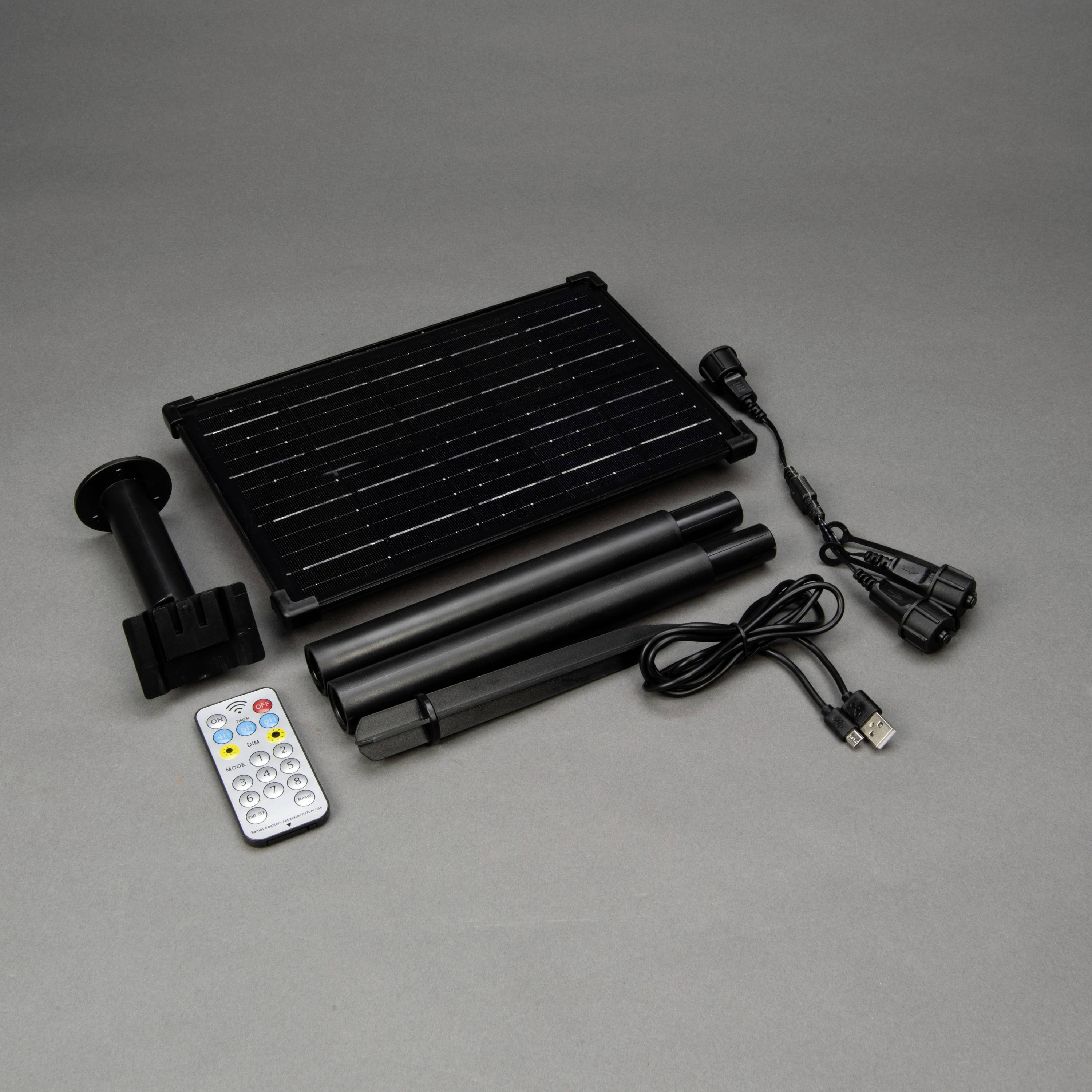 Solarmodul-Kit mit Panel, Halterung, zwei Stangen, Fernbedienung und Kabel. Geeignet für einfache Solaranwendungen im Freien.