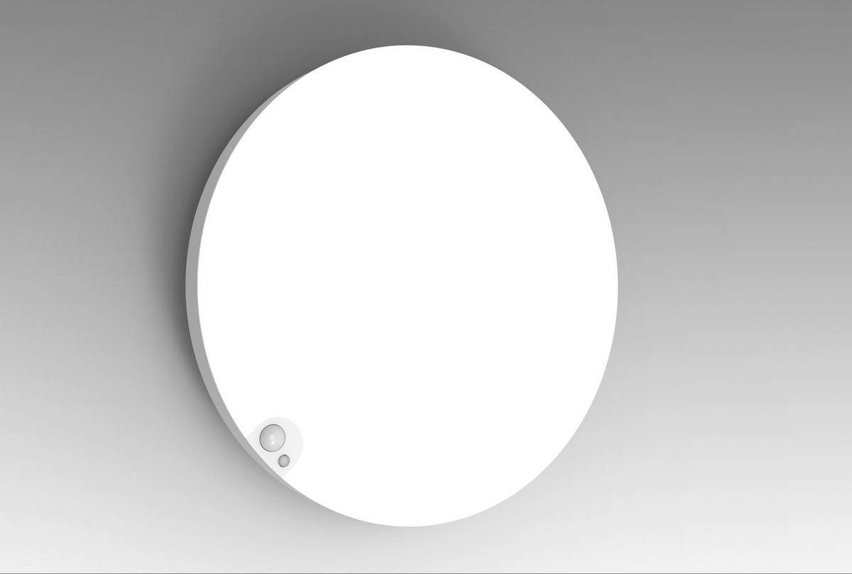 Eine weiße Kunststoffwanduhr auf grauem Hintergrund, ohne sichtbare Zeiger oder Zahlen.