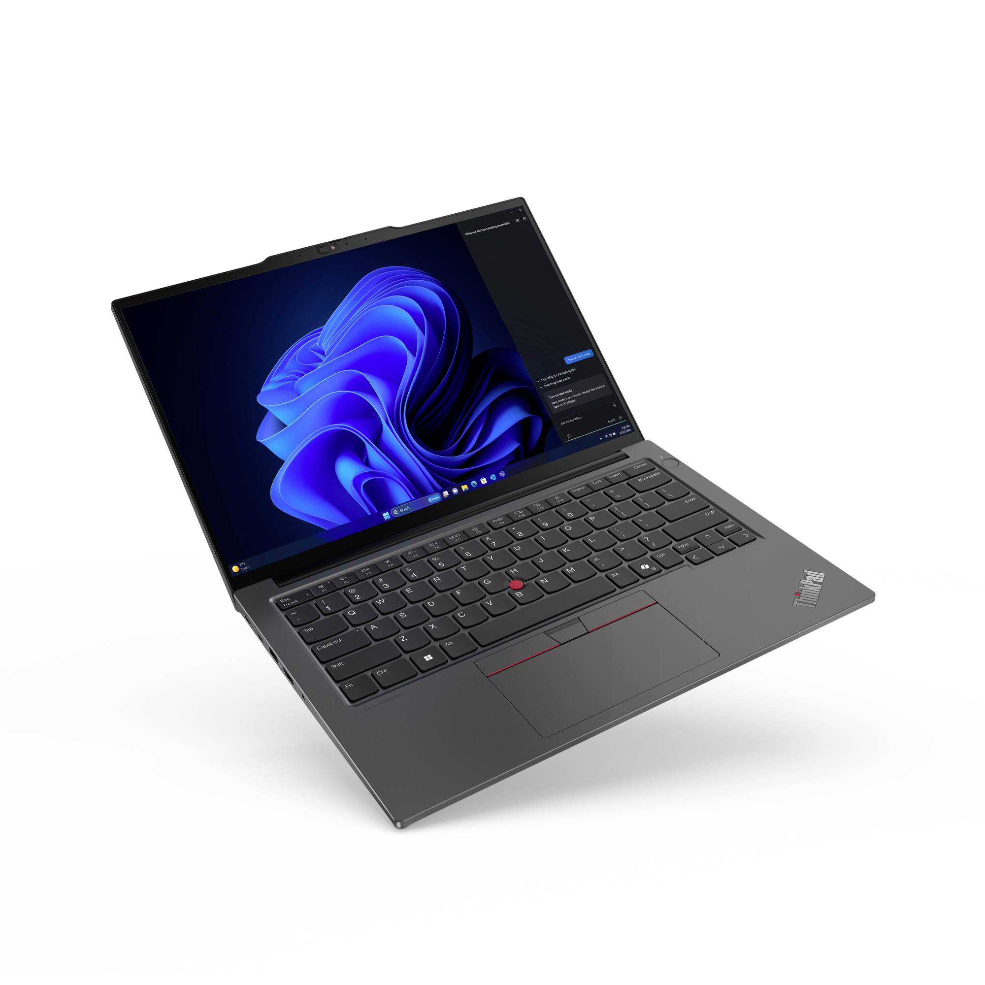 Ein schwarzer Laptop, geöffnet mit einem blauen Bildschirmhintergrund. Zeigt eine Tastatur mit rotem TrackPoint und ein Touchpad.