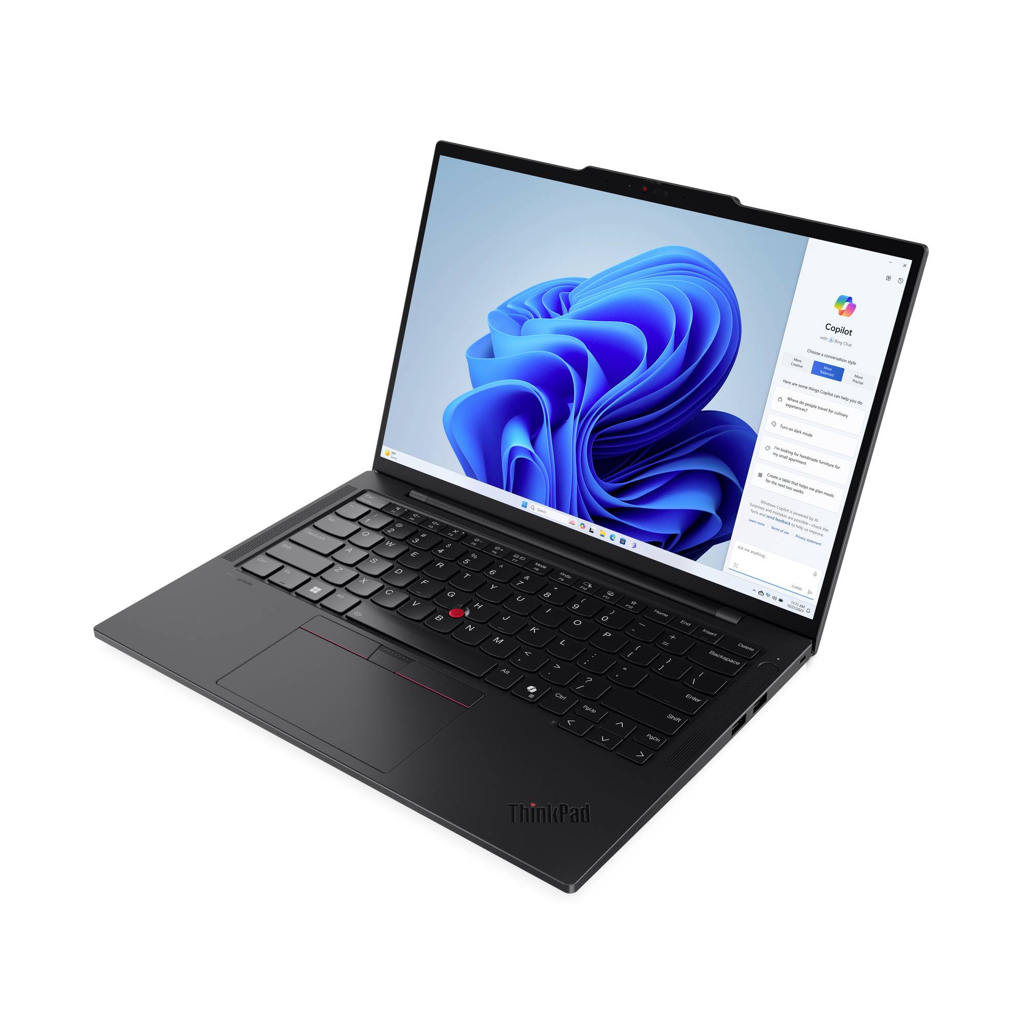 Ein geöffneter Laptop mit schwarzem Gehäuse zeigt den Windows 11-Desktop auf dem Bildschirm, mit einem blauen Hintergrund und geöffneter Capita-App.