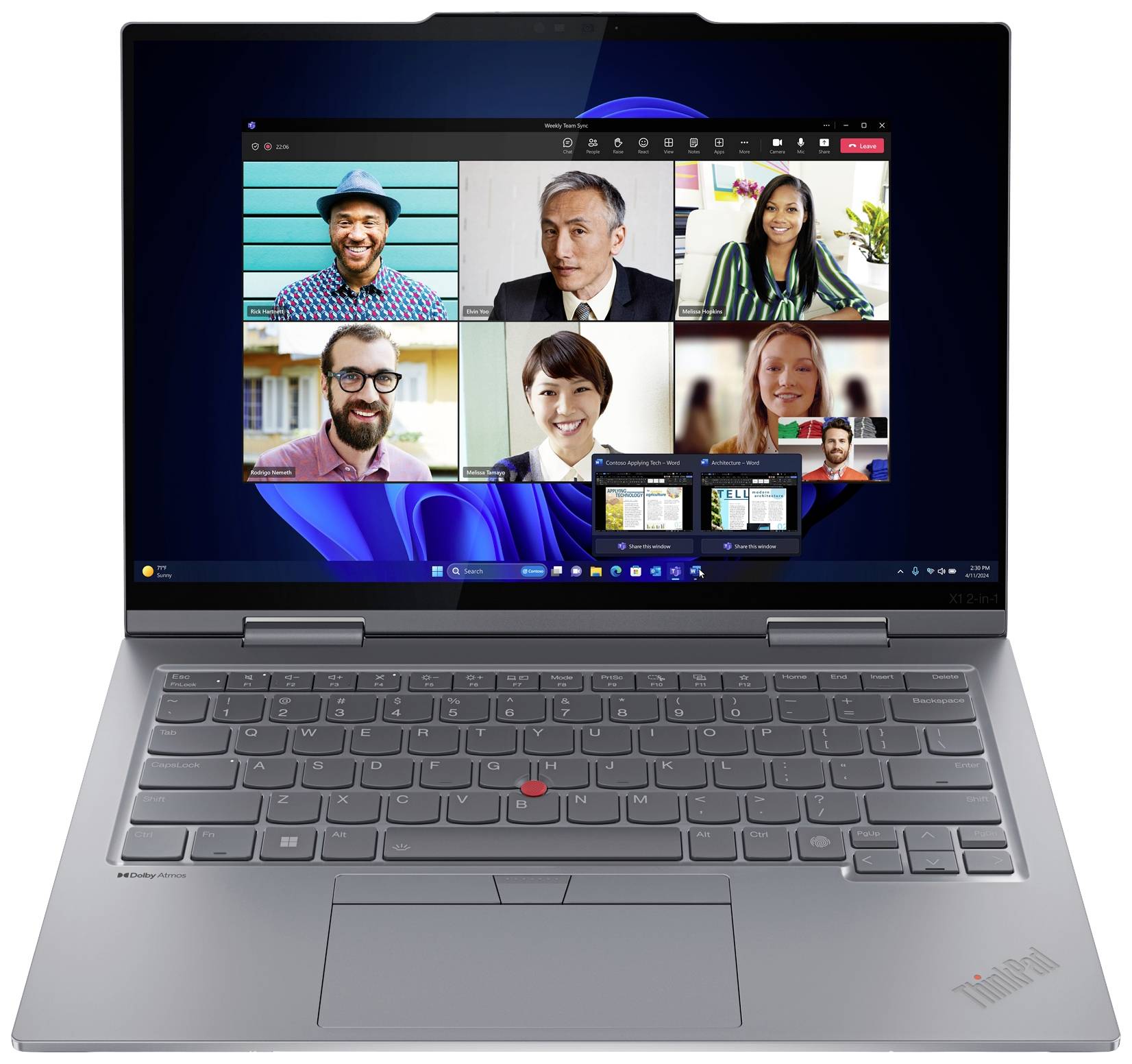 Laptop mit offenem Display zeigt einen Videoanruf mit sechs Personen in einem Konferenztool. Tastatur und Touchpad sind sichtbar.