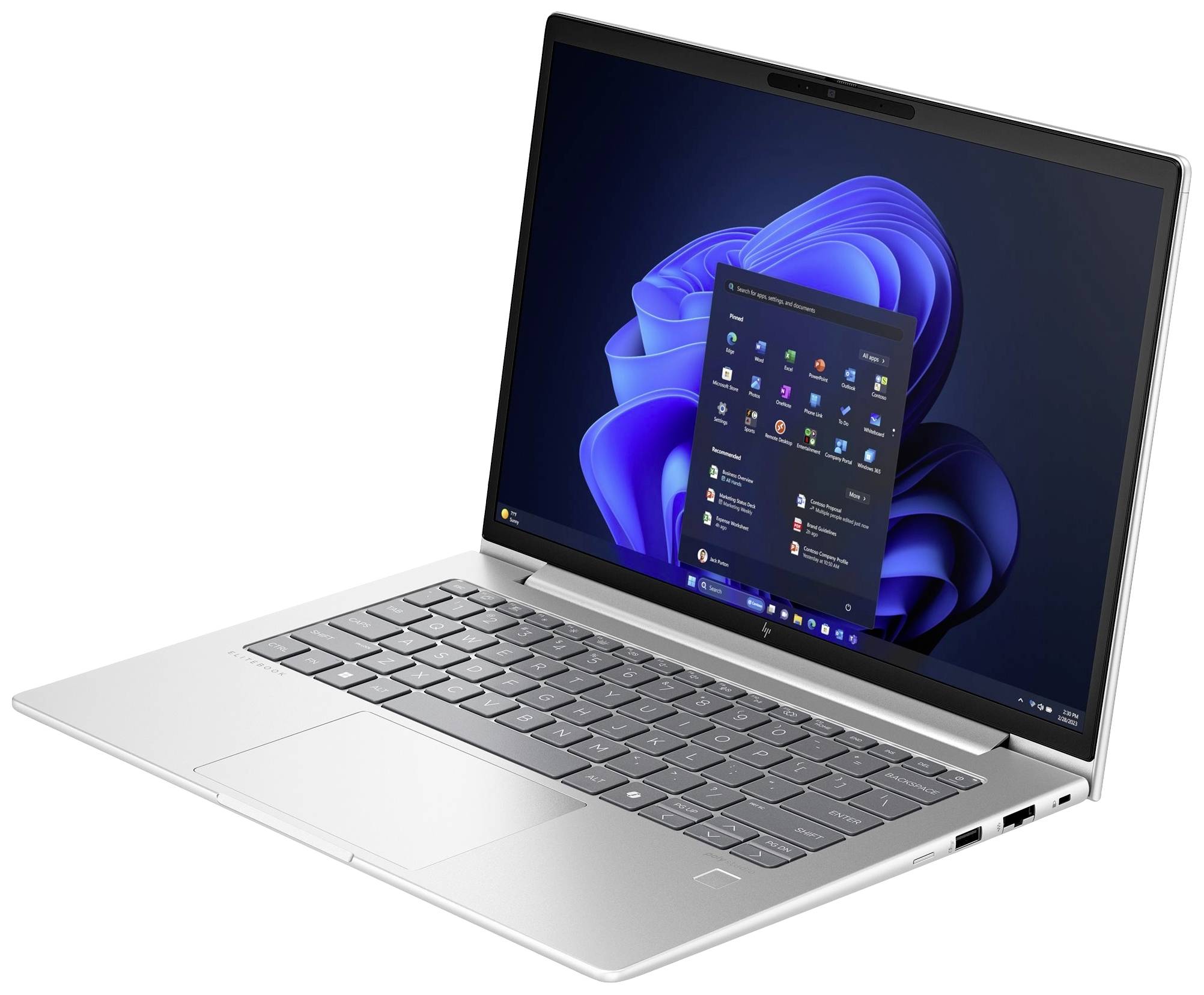 Ein offener Laptop mit Windows-Betriebssystem, Startmenü auf dem Bildschirm sichtbar. Der Laptop ist silbern mit einer deutschen Tastatur.