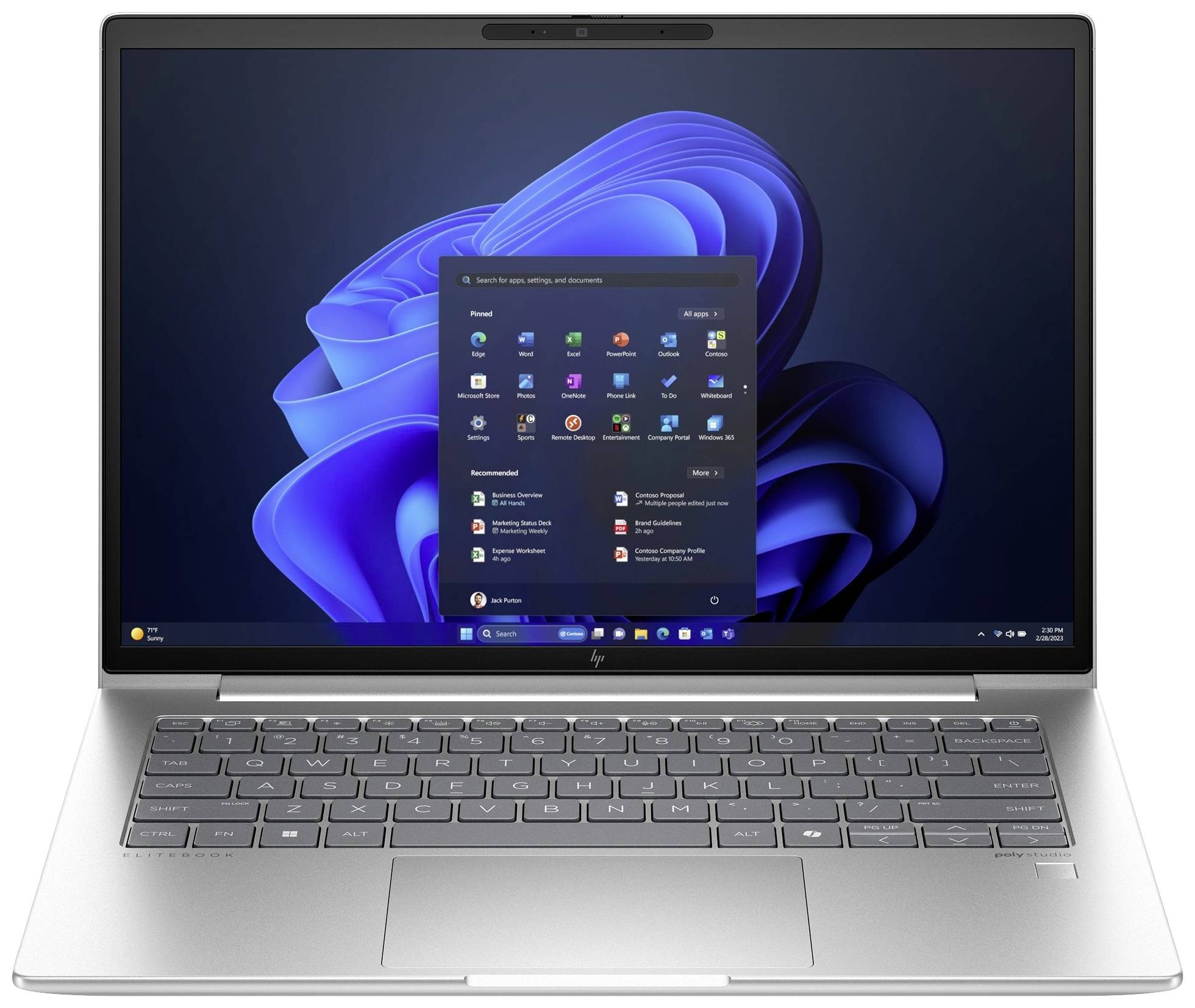 Ein geöffneter Laptop mit Windows-Startbildschirm. Der Bildschirm zeigt mehrere App-Symbole und das Windows-Logo auf blauem Hintergrund.