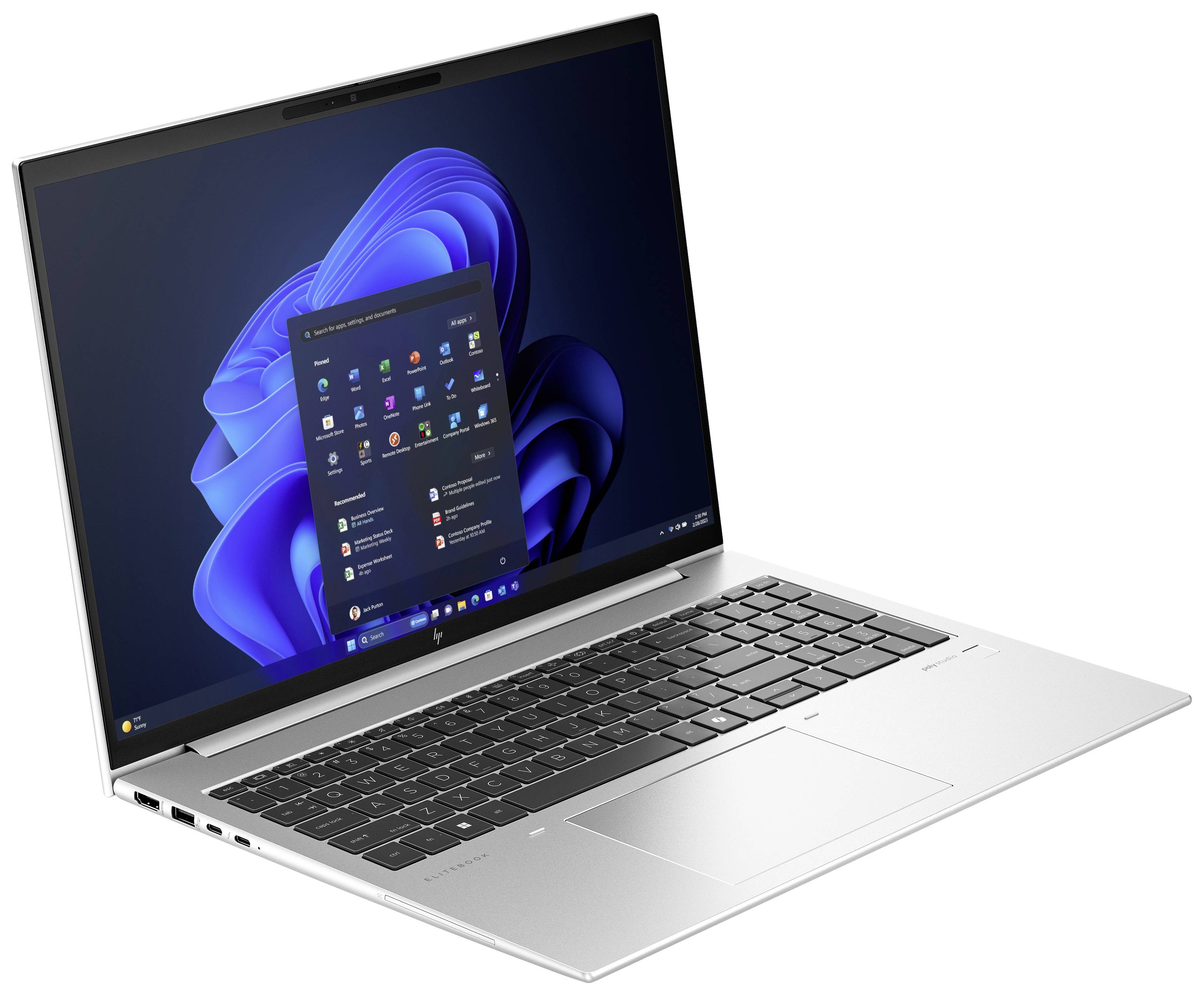 Ein moderner Laptop mit Windows 11-Betriebssystem zeigt das Startmenü. Der Laptop hat ein silbernes Gehäuse und schwarzes Keyboard.
