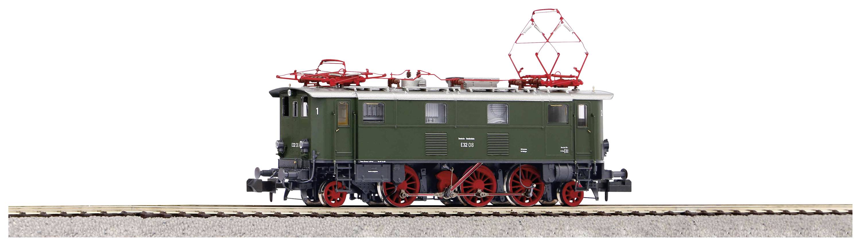 Modell einer grünen, altmodischen Elektrolokomotive auf Gleisen, mit roten Stromabnehmern und viel Detailarbeit.