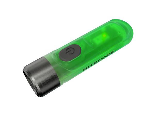 Eine grüne Taschenlampe mit schwarzem Ein- und Ausschalter und metallischem Kopfteil; Marke 'Nitecore' auf der Seite.