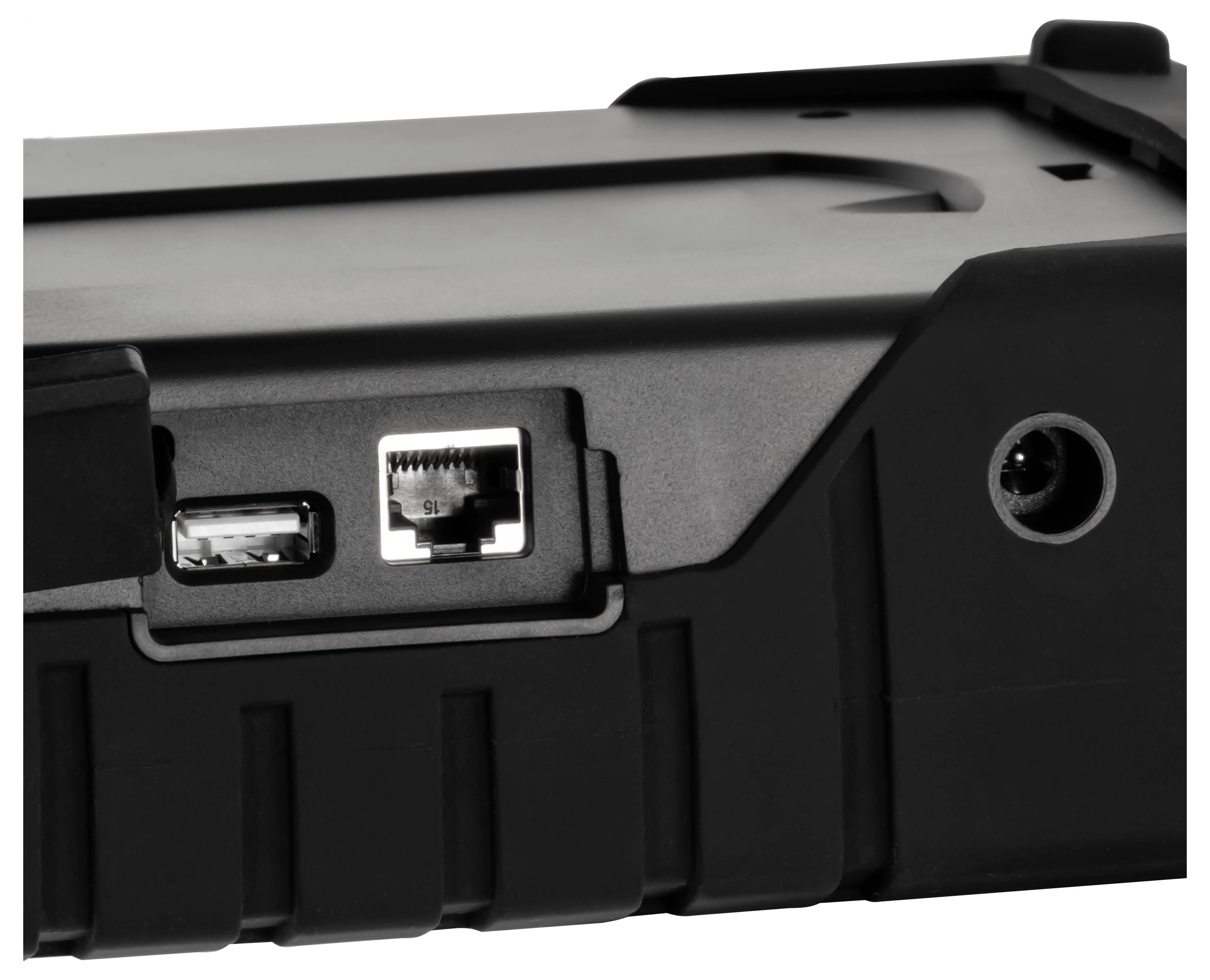 Nahaufnahme eines schwarzen Geräts mit USB-Anschluss, Ethernet-Anschluss und rundem Stromanschluss auf der Seite.