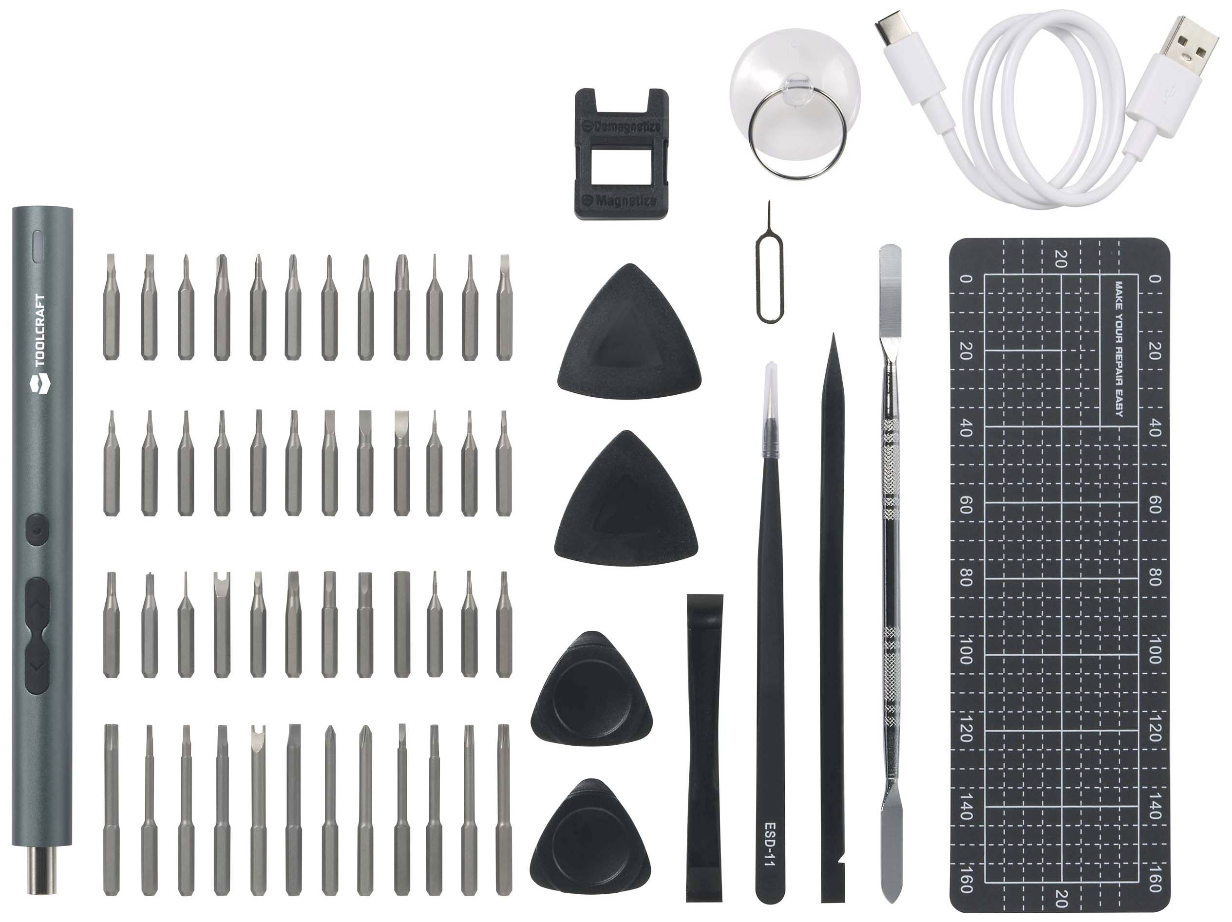 Ein Set von Präzisionswerkzeugen bestehend aus Schraubendrehern, Aufsätzen, Pinzetten, Hebelwerkzeugen und einer Kabelrolle, angeordnet auf einer Magnetmatte.