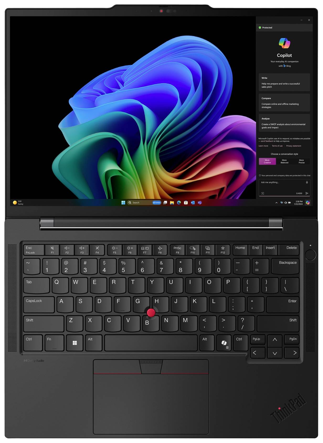 Laptop mit geöffnetem Bildschirm, zeigt farbenfrohes Betriebssystem-Interface; Tastatur und Trackpad darunter sichtbar.