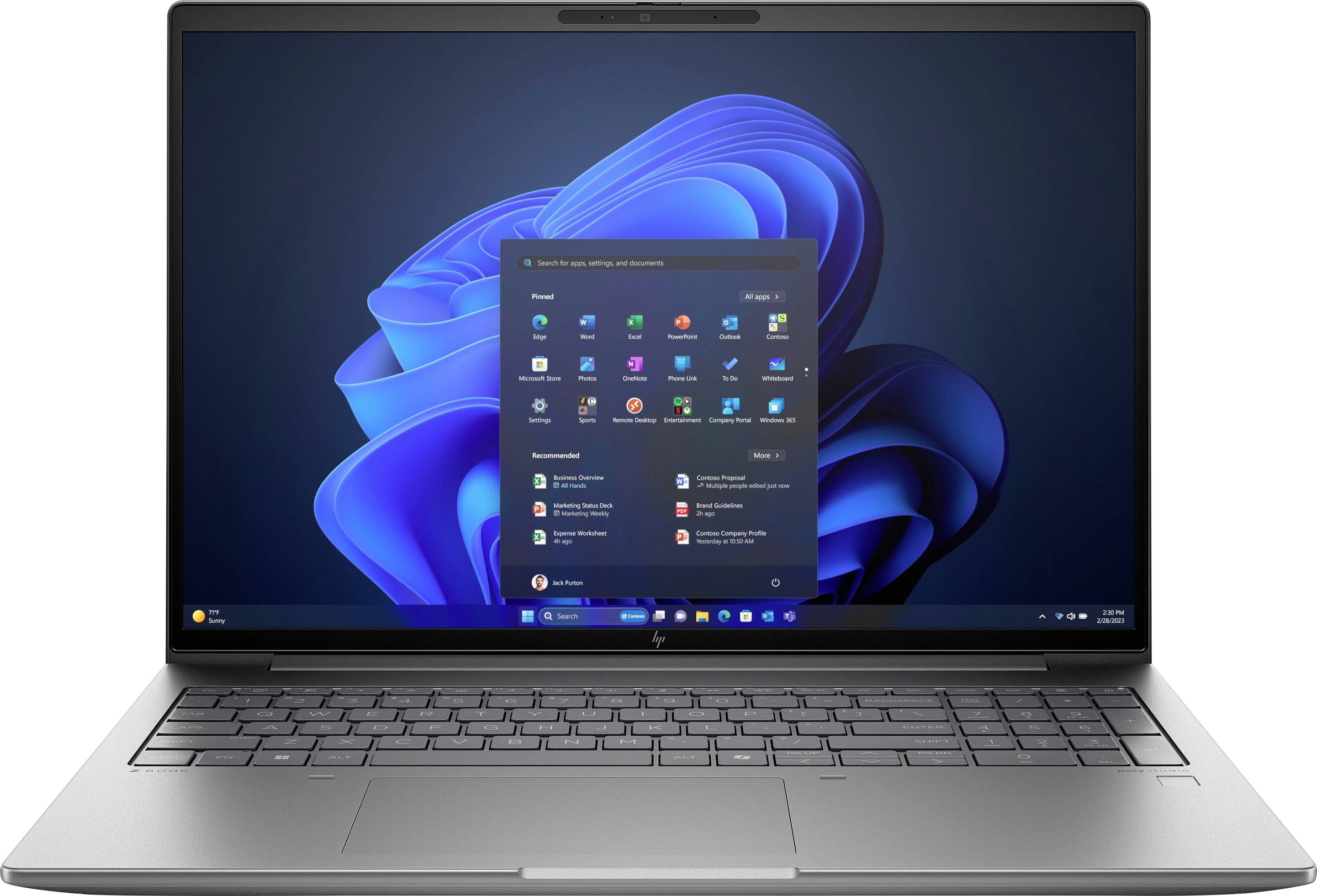 Ein geöffneter Laptop mit einem Bildschirm, der die Startseite von Windows 11 zeigt, einschließlich des Startmenüs mit verschiedenen App-Symbolen.